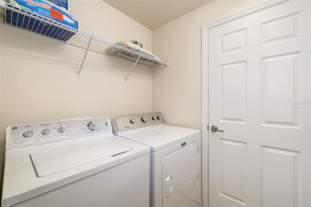 6923 Grand Estuary Trl Unit 101, Bradenton, FL 34212 - washroom featuring separate washer and dryer