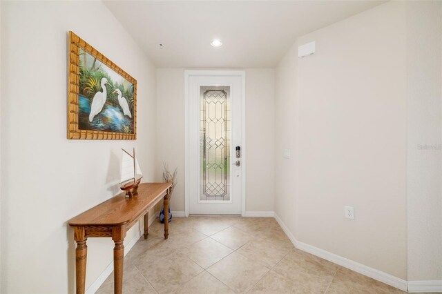 6923 Grand Estuary Trl Unit 101, Bradenton, FL 34212 - foyer entrance with recessed lighting and light tile patterned floors
