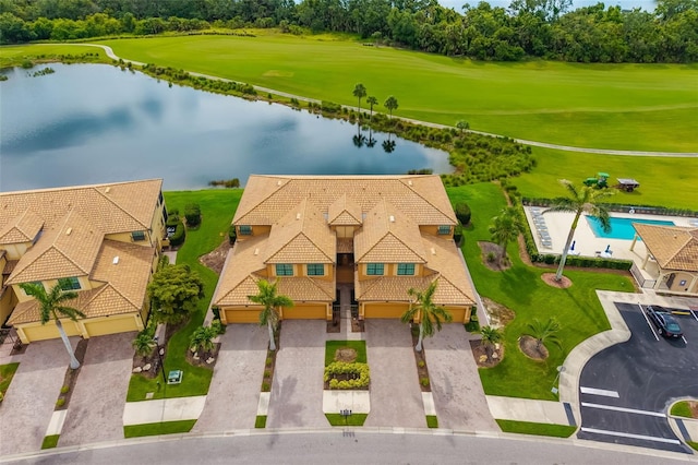 6923 Grand Estuary Trl Unit 101, Bradenton, FL 34212 - drone / aerial view of a large body of water and a golf course