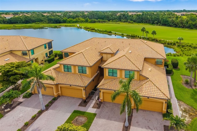 6923 Grand Estuary Trl Unit 101, Bradenton, FL 34212 - view from above of property featuring a large body of water and a tree filled landscape