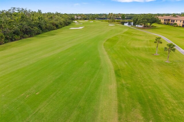 6923 Grand Estuary Trl Unit 101, Bradenton, FL 34212 - bird's eye view of a local golf course and a nearby body of water