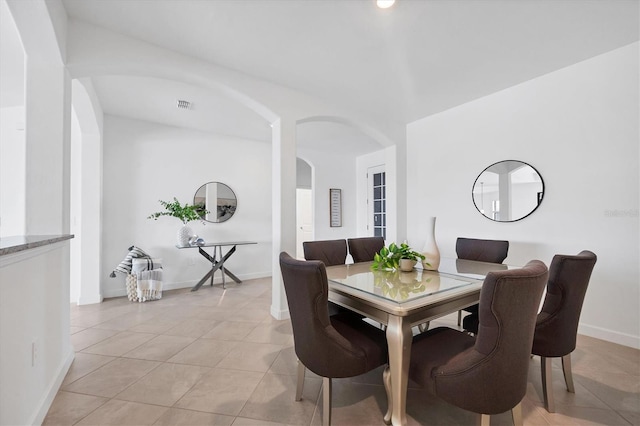 15344 Serene Shores Loop, Lakewood Ranch, FL 34211 - dining space featuring arched walkways and light tile patterned floors