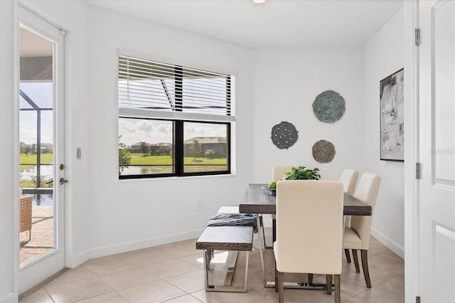 15344 Serene Shores Loop, Lakewood Ranch, FL 34211 - dining space featuring healthy amount of natural light and light tile patterned floors