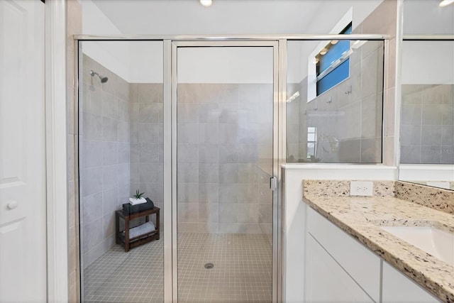 15344 Serene Shores Loop, Lakewood Ranch, FL 34211 - bathroom featuring vanity and a stall shower
