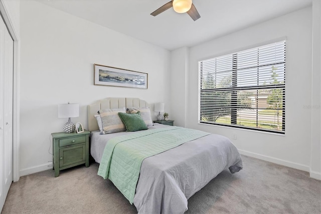 15344 Serene Shores Loop, Lakewood Ranch, FL 34211 - bedroom with light colored carpet and ceiling fan