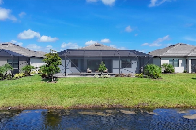 15344 Serene Shores Loop, Lakewood Ranch, FL 34211 - back of property with a water view and a lawn