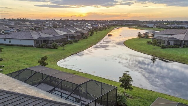 15344 Serene Shores Loop, Lakewood Ranch, FL 34211 - aerial view at dusk of a water view and a residential view