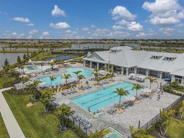 15344 Serene Shores Loop, Lakewood Ranch, FL 34211 - drone / aerial view of a pool area and a nearby body of water