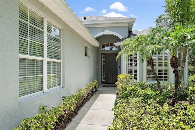 5508 Whitehead St, Bradenton, FL 34203 - entrance to property with stucco siding and a shingled roof