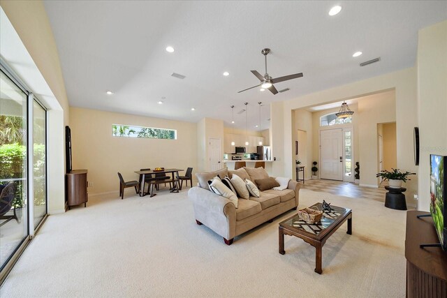 5508 Whitehead St, Bradenton, FL 34203 - living area with light carpet, recessed lighting, and a ceiling fan