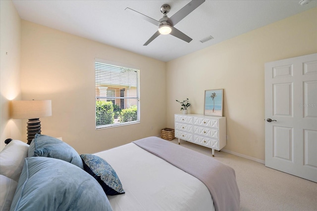 5508 Whitehead St, Bradenton, FL 34203 - bedroom with light colored carpet and ceiling fan