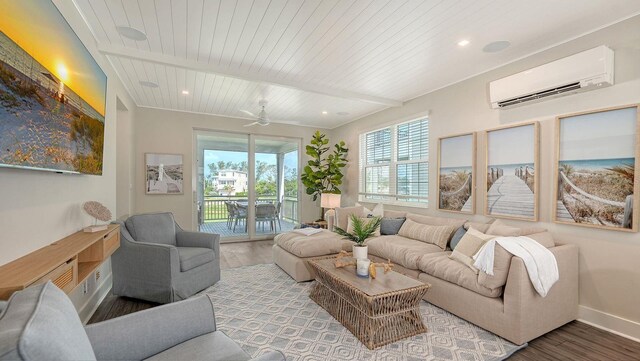 4322 Marina View Way, Cortez, FL 34215 - living room featuring a wall mounted air conditioner, wood finished floors, ceiling fan, baseboards, and wooden ceiling with exposed beams