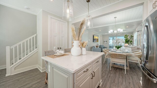 4322 Marina View Way, Cortez, FL 34215 - kitchen featuring freestanding refrigerator, open floor plan, dark wood finished floors, a center island, and wood ceiling with exposed beams