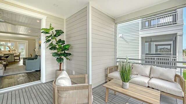 4322 Marina View Way, Cortez, FL 34215 - wooden deck with an outdoor living space