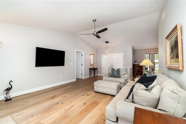 4353 Indian Point Trl, Sarasota, FL 34238 - living area with vaulted ceiling, ceiling fan, and light wood-type flooring