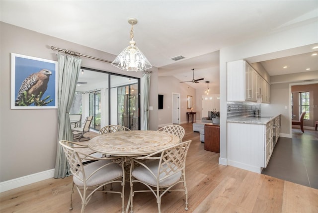 4353 Indian Point Trl, Sarasota, FL 34238 - dining area featuring a chandelier, light wood finished floors, recessed lighting, and a ceiling fan