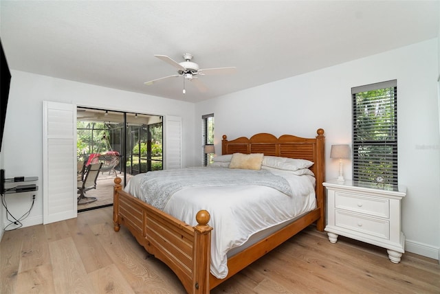 4353 Indian Point Trl, Sarasota, FL 34238 - bedroom featuring access to exterior, light wood-style flooring, and ceiling fan