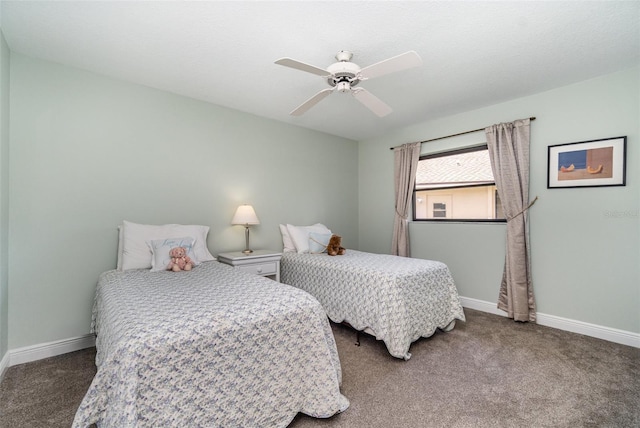 4353 Indian Point Trl, Sarasota, FL 34238 - carpeted bedroom with baseboards and a ceiling fan