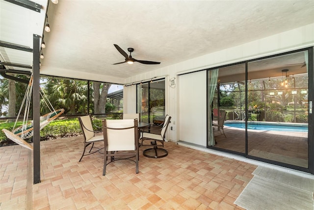 4353 Indian Point Trl, Sarasota, FL 34238 - sunroom with brick patterned flooring and plenty of natural light