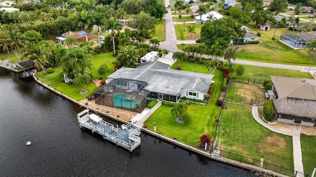 14544 Riverside Dr, Fort Myers, FL 33905 - aerial perspective of suburban area featuring a large body of water and a pool area