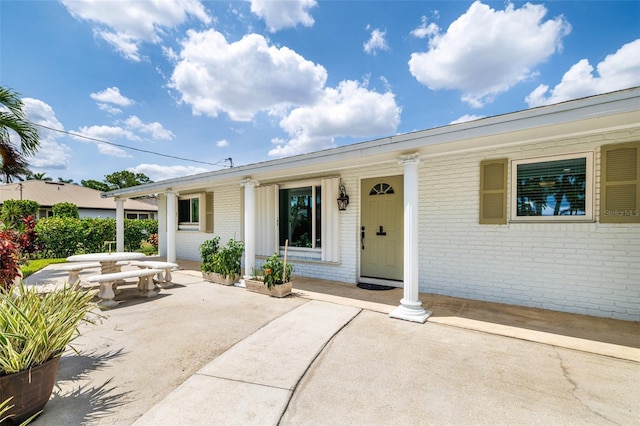 14544 Riverside Dr, Fort Myers, FL 33905 - entrance to property featuring brick siding