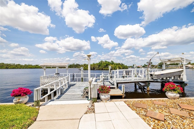 14544 Riverside Dr, Fort Myers, FL 33905 - dock featuring boat lift and a water view