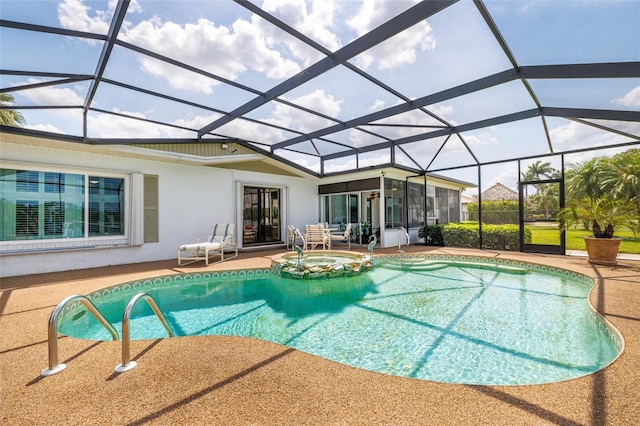 14544 Riverside Dr, Fort Myers, FL 33905 - view of pool featuring a patio, a pool with connected hot tub, and a lanai