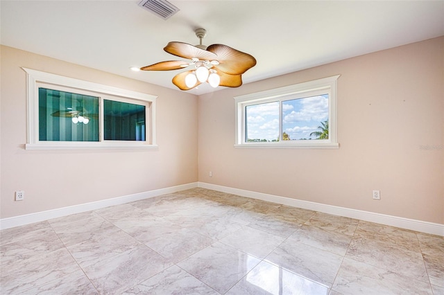14544 Riverside Dr, Fort Myers, FL 33905 - spare room featuring baseboards