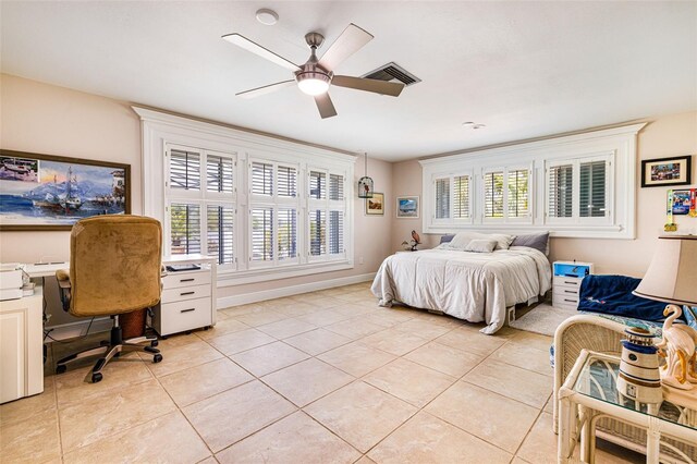 14544 Riverside Dr, Fort Myers, FL 33905 - bedroom featuring light tile patterned flooring, an office area, and ceiling fan