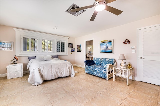 14544 Riverside Dr, Fort Myers, FL 33905 - bedroom featuring light tile patterned floors, baseboards, and a ceiling fan