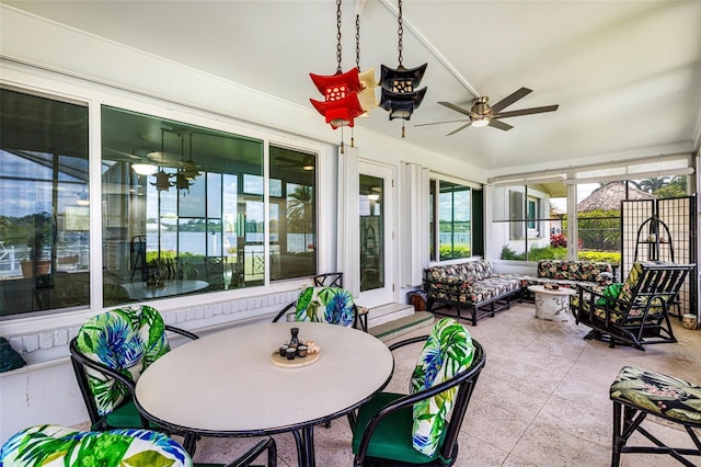 14544 Riverside Dr, Fort Myers, FL 33905 - sunroom with a ceiling fan, an outdoor hangout area, and vaulted ceiling
