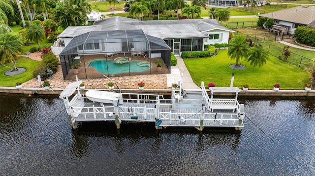 14544 Riverside Dr, Fort Myers, FL 33905 - dock area featuring a water view, an outdoor pool, a patio area, a lanai, and boat lift