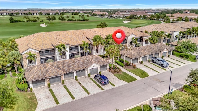 5528 Palmer Cir Unit 104, Bradenton, FL 34211 - aerial perspective of suburban area featuring a local golf course