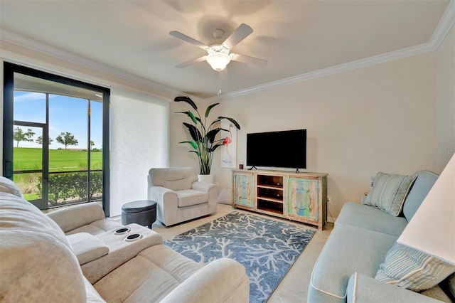 5528 Palmer Cir Unit 104, Bradenton, FL 34211 - living room featuring ornamental molding, a ceiling fan, golf course view, and tile patterned floors