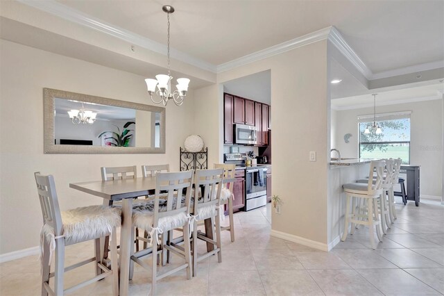 5528 Palmer Cir Unit 104, Bradenton, FL 34211 - dining space featuring a chandelier, crown molding, baseboards, and light tile patterned flooring
