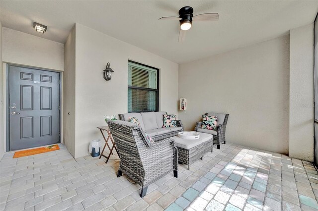 5528 Palmer Cir Unit 104, Bradenton, FL 34211 - view of patio / terrace with ceiling fan and outdoor lounge area
