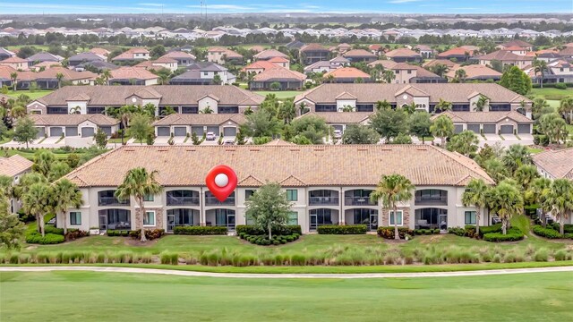 5528 Palmer Cir Unit 104, Bradenton, FL 34211 - bird's eye view of a golf course