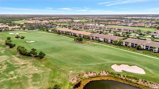 5528 Palmer Cir Unit 104, Bradenton, FL 34211 - aerial view of residential area featuring a local golf course and a nearby body of water