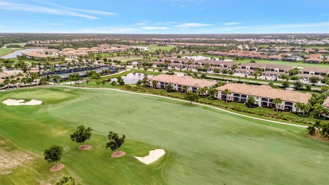5528 Palmer Cir Unit 104, Bradenton, FL 34211 - aerial perspective of suburban area with a golf club and a large body of water