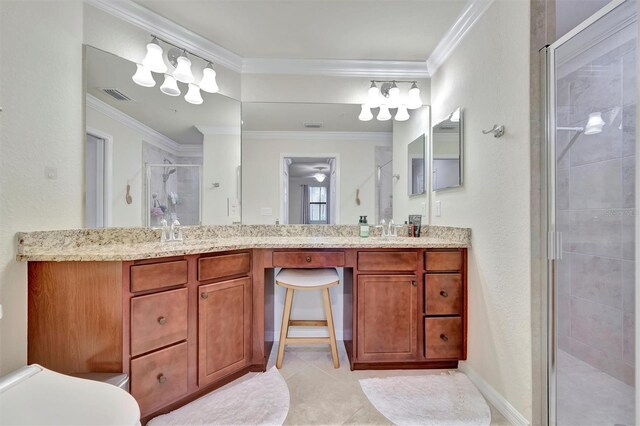 5528 Palmer Cir Unit 104, Bradenton, FL 34211 - full bathroom featuring double vanity, a stall shower, ornamental molding, and tile patterned flooring
