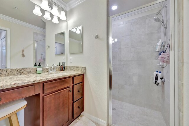 5528 Palmer Cir Unit 104, Bradenton, FL 34211 - bathroom featuring a stall shower, vanity, and crown molding