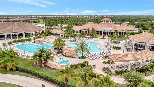 5528 Palmer Cir Unit 104, Bradenton, FL 34211 - community pool with a pergola