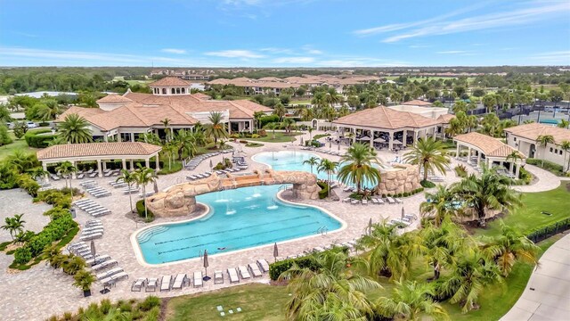 5528 Palmer Cir Unit 104, Bradenton, FL 34211 - community pool featuring a residential view