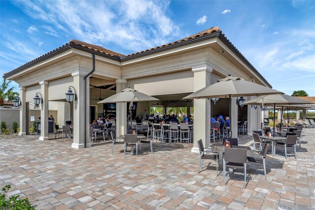 5528 Palmer Cir Unit 104, Bradenton, FL 34211 - view of patio with outdoor dining space