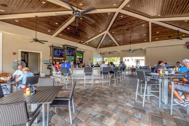 5528 Palmer Cir Unit 104, Bradenton, FL 34211 - view of patio with ceiling fan and outdoor dining area