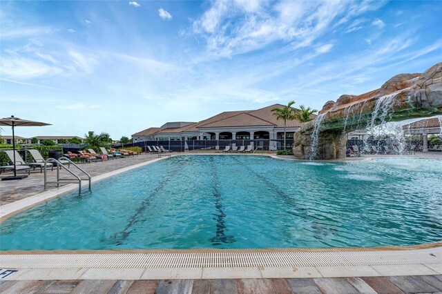 5528 Palmer Cir Unit 104, Bradenton, FL 34211 - community pool featuring a patio area