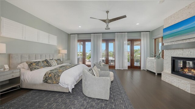 795 Marbury Ln, Longboat Key, FL 34228 - bedroom with access to exterior, wood finished floors, multiple windows, and recessed lighting
