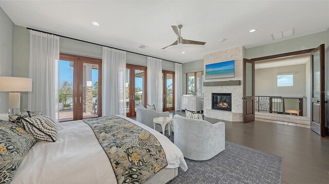 795 Marbury Ln, Longboat Key, FL 34228 - bedroom with french doors, access to outside, wood finished floors, a fireplace, and a ceiling fan