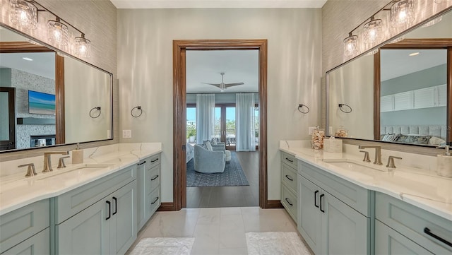 795 Marbury Ln, Longboat Key, FL 34228 - bathroom featuring ensuite bath, two vanities, marble finish floors, and ceiling fan