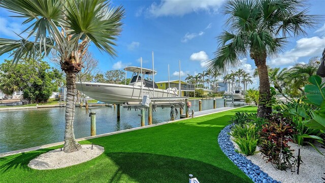 795 Marbury Ln, Longboat Key, FL 34228 - surrounding community featuring boat lift, a boat dock, a water view, and a yard